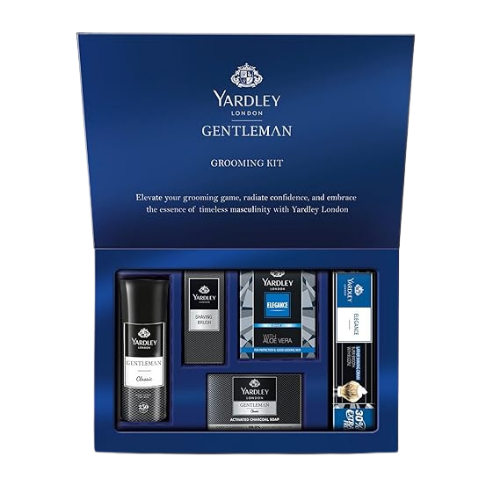 Yardley London men grooming kit with charcoal soap, shaving cream, aftershave, brush, and deodorant spray.